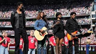 Infinity Song performs the National Anthem at the Melbourne Game